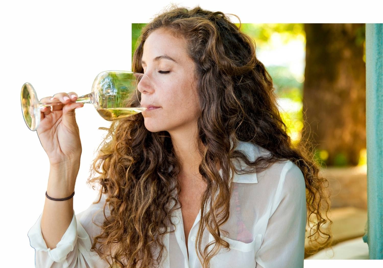 Woman enjoying wine from elegant Tritan glassware